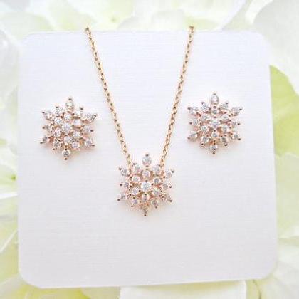 Rose Gold Snowflake Earrings &..
